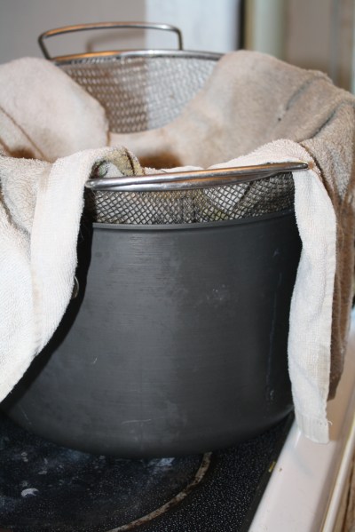 There's a shadow in this picture that makes my towel look dirtier than it is :)  I actually have two dedicated terrycloth towels I use only for straining food...they look pretty awful :)